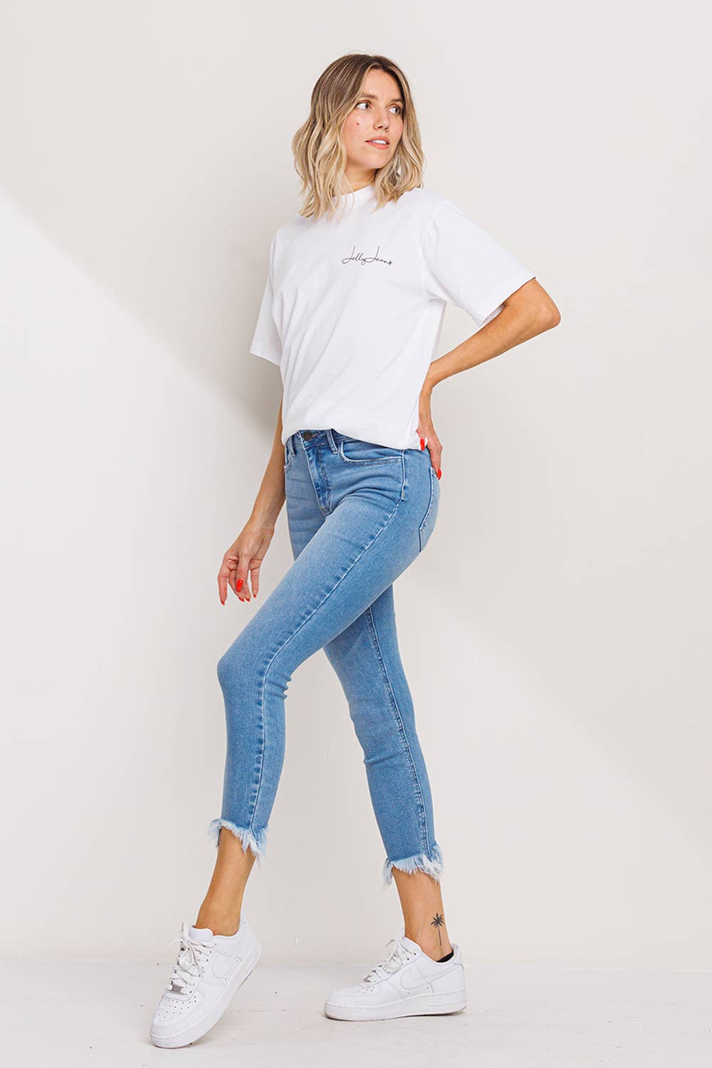Mandy Mid Rise Chew Hem Skinny Jeans ~ Light Wash